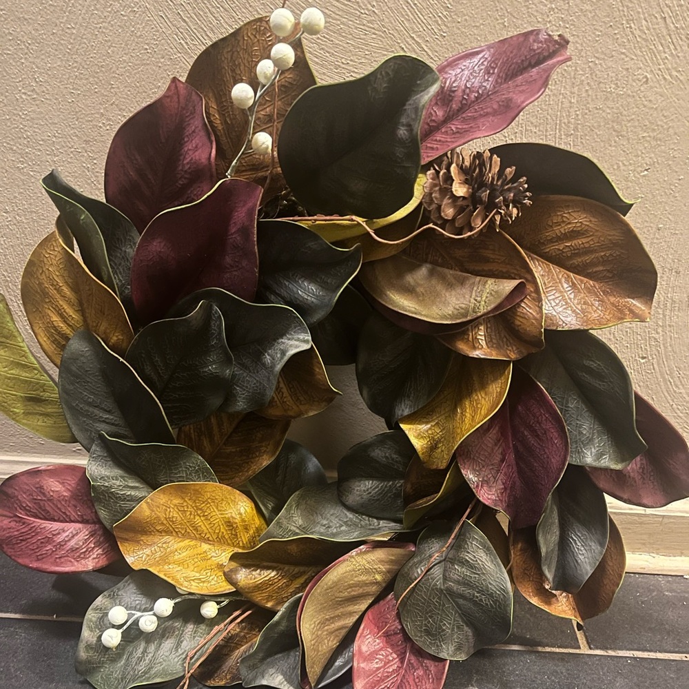 Magnolia leaf fall wreath with accents you left already. pinecones and Berries